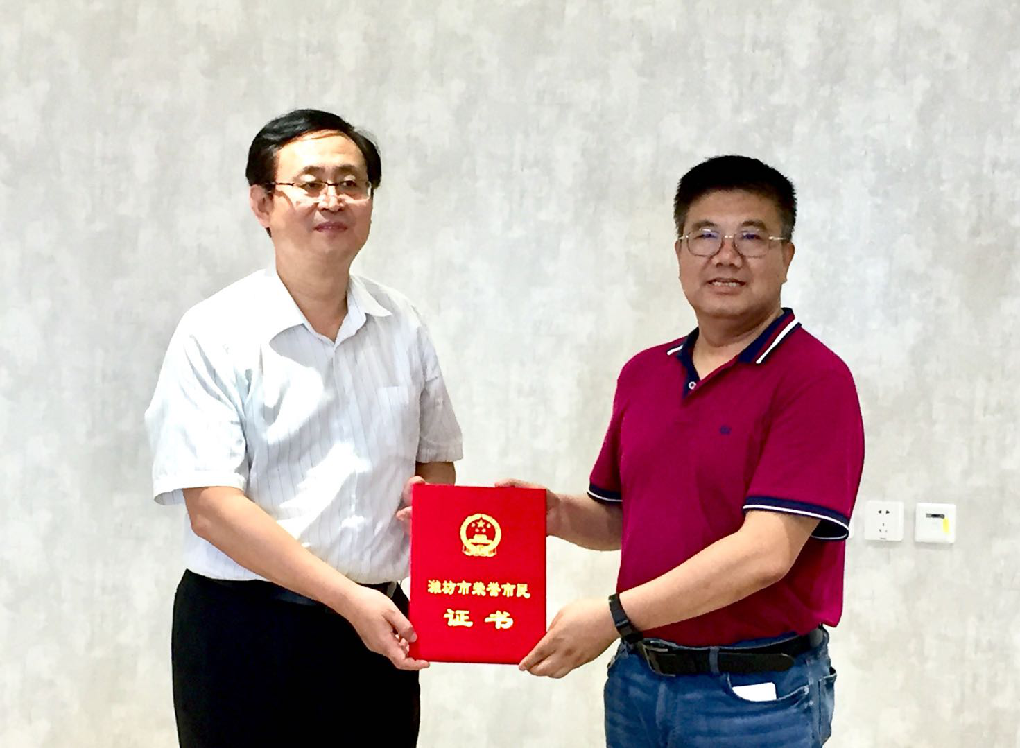 Nedham was awarded “Honorary Citizen of Weifang”